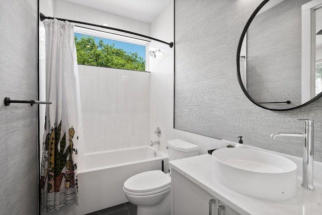 full bathroom featuring tile flooring, oversized vanity, toilet, and shower / tub combo