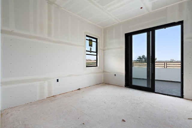 spare room featuring a wealth of natural light