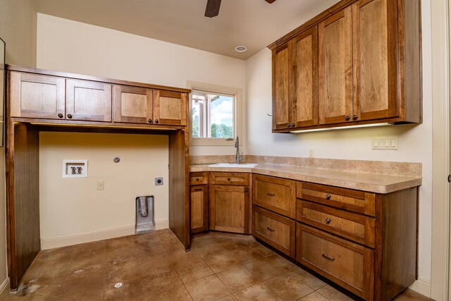 kitchen with ceiling fan and sink