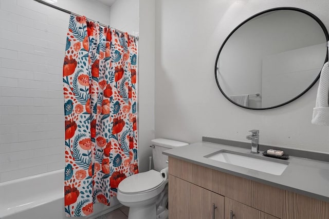 full bathroom featuring vanity, shower / bath combo with shower curtain, and toilet