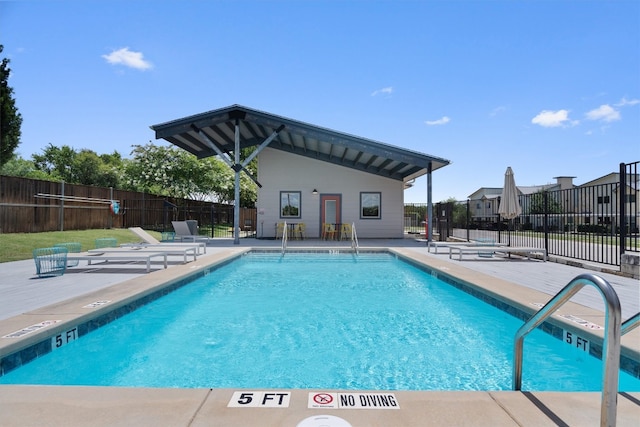 view of pool with a patio area