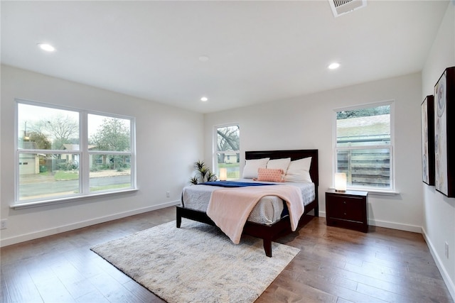 bedroom featuring wood-type flooring