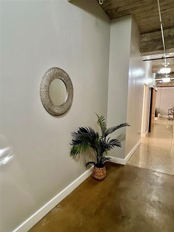 hallway featuring concrete floors