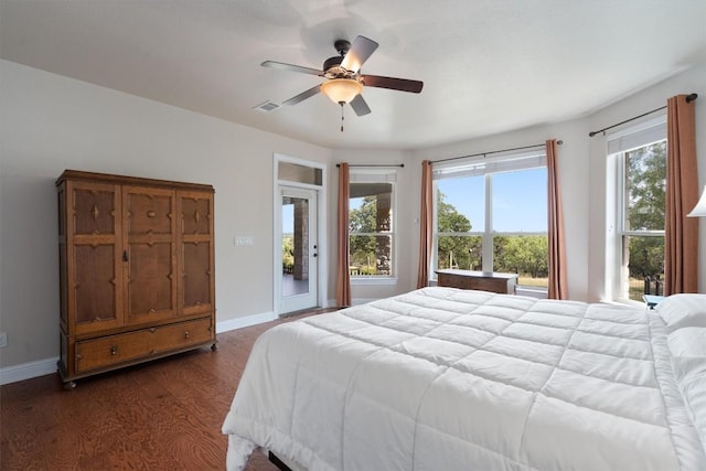 bedroom featuring ceiling fan, access to outside, and dark hardwood / wood-style flooring