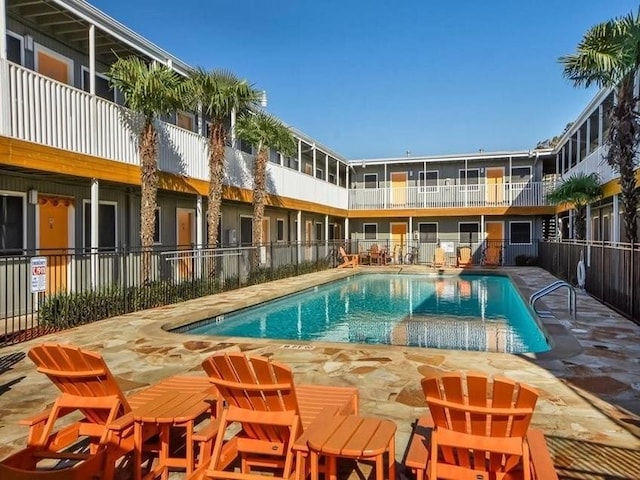 view of pool featuring a patio area