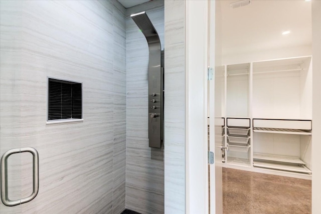 full bath featuring a shower stall