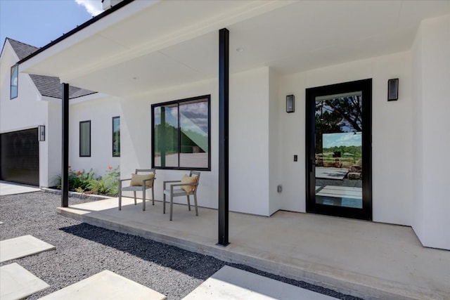 14208 Fort Smith Trl, Austin, TX 78734 - property entrance with stucco siding and a patio area