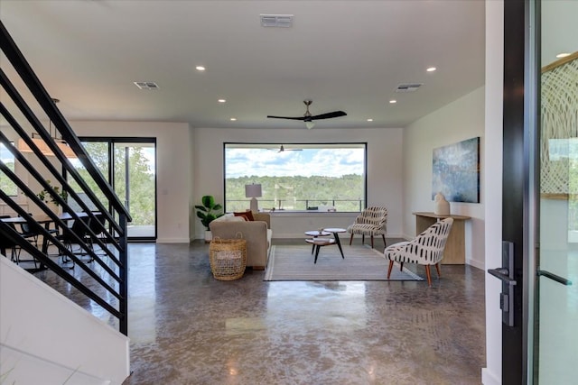 living room featuring ceiling fan