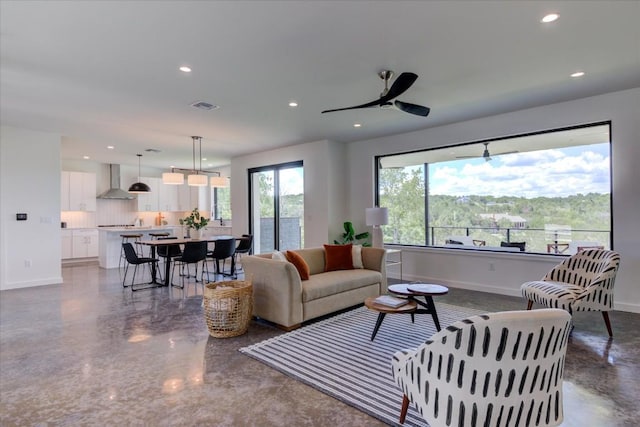 living room featuring ceiling fan