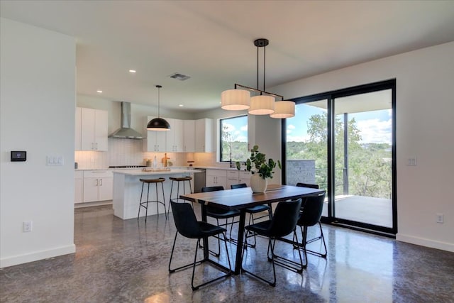 dining room featuring sink