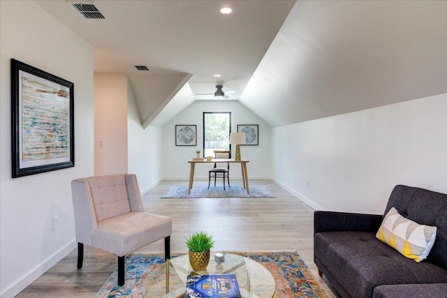 living area with recessed lighting, visible vents, baseboards, vaulted ceiling, and light wood-type flooring