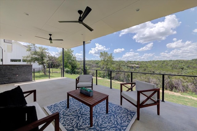 14208 Fort Smith Trl, Austin, TX 78734 - view of patio with outdoor lounge area, ceiling fan, and a forest view