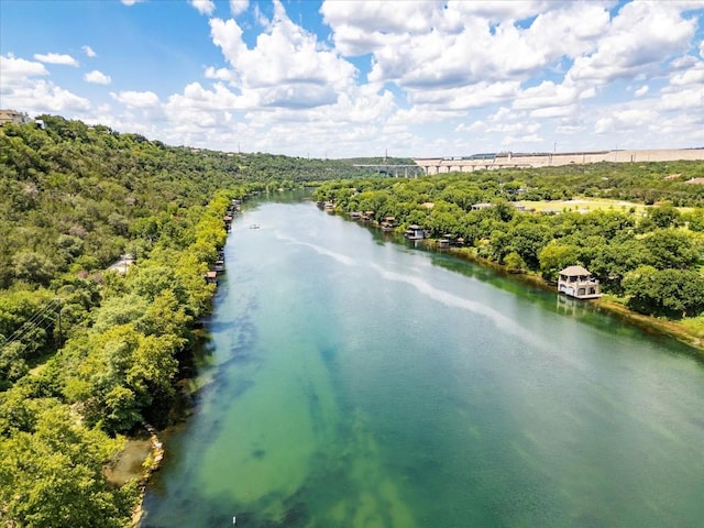 birds eye view of property featuring a water view