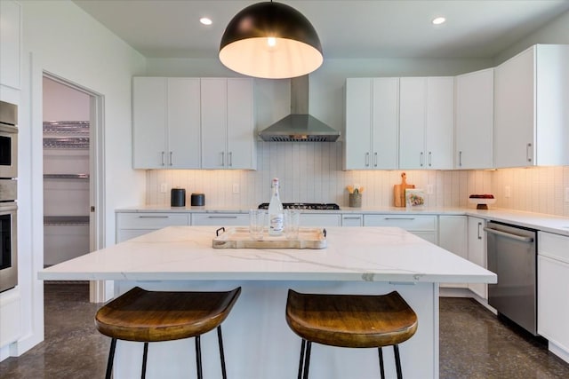 14208 Fort Smith Trl, Austin, TX 78734 - kitchen with appliances with stainless steel finishes, wall chimney exhaust hood, a kitchen breakfast bar, finished concrete floors, and backsplash