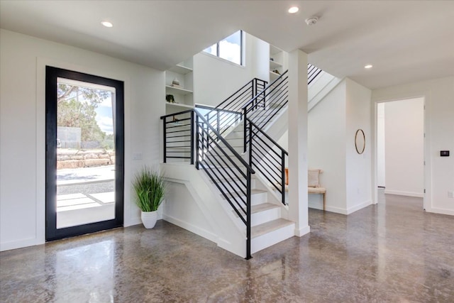 14208 Fort Smith Trl, Austin, TX 78734 - foyer entrance with healthy amount of natural light, stairway, recessed lighting, baseboards, and finished concrete flooring