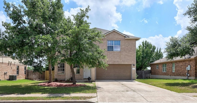 view of front of property featuring central AC, a front lawn, and a garage