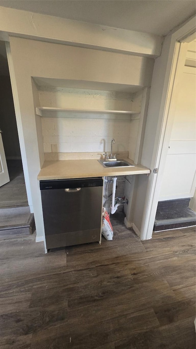 101 S Lockhart St, Manor, TX 78653 - interior space with stainless steel dishwasher, a sink, and wood finished floors