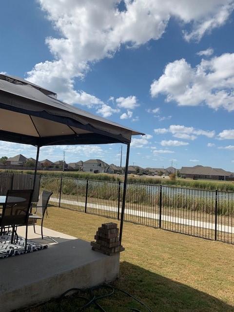 view of yard with a gazebo and a patio area