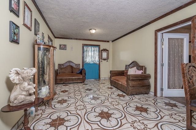 interior space with a textured ceiling, ornamental molding, and tile flooring