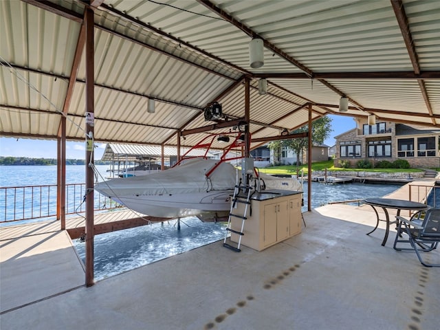 dock area featuring a water view