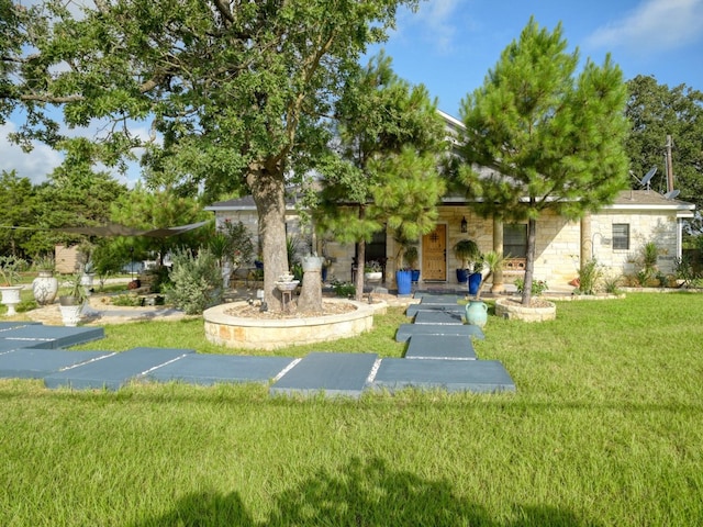 view of community featuring a lawn