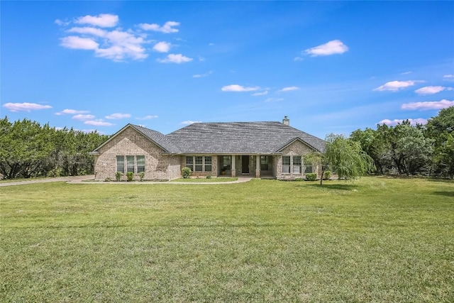 view of front of house with a front lawn