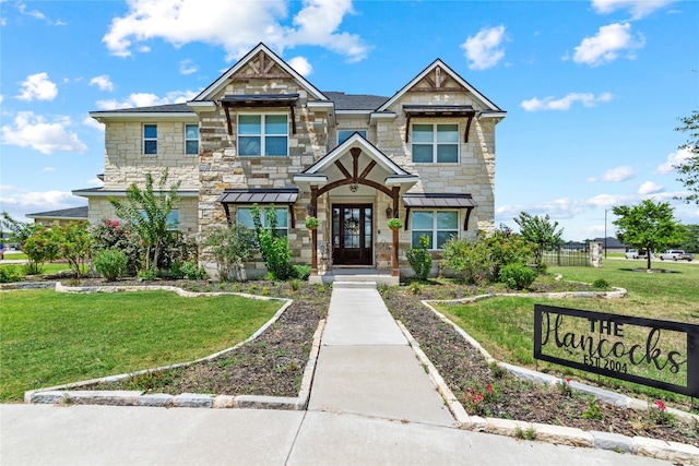 view of front of property with a front yard