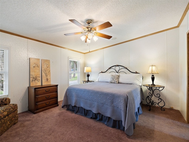 bedroom featuring ornamental molding, carpet, a textured ceiling, and ceiling fan