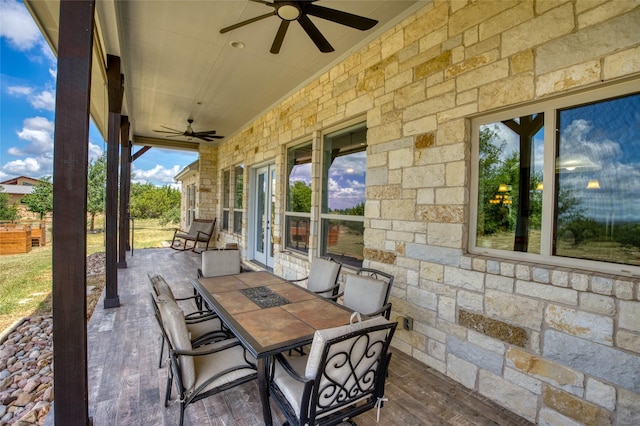 view of patio / terrace featuring ceiling fan