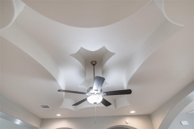 interior details featuring ceiling fan