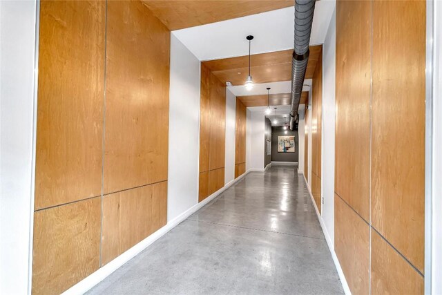 2124 E 6th St Unit 305, Austin, TX 78702 - corridor with concrete flooring and baseboards