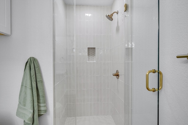 bathroom featuring an enclosed shower