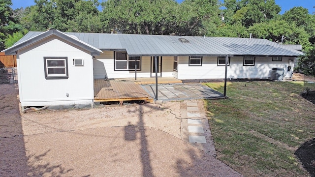 view of front of property featuring a wooden deck