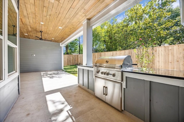 view of patio featuring an outdoor kitchen and grilling area