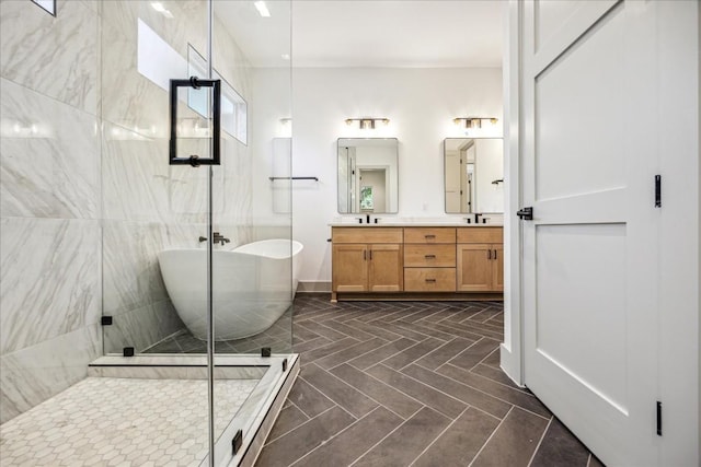 bathroom with parquet floors, vanity, and independent shower and bath