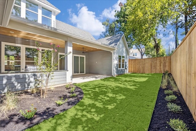 exterior space featuring a patio and a lawn