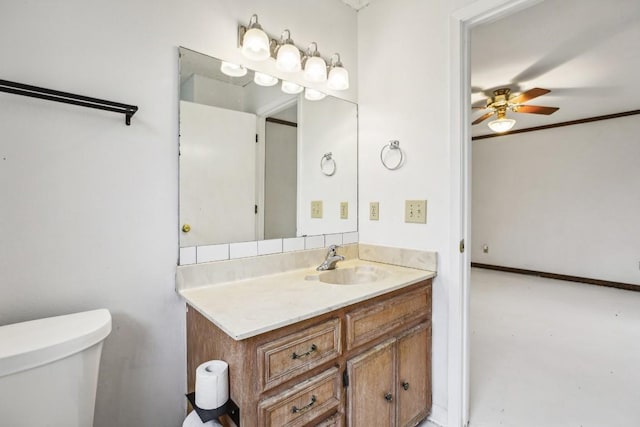 bathroom featuring concrete flooring, vanity, toilet, and ceiling fan