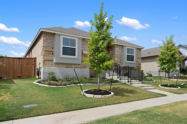 view of front of home with a front lawn