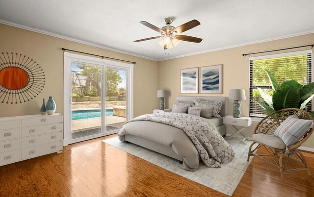 8712 Cele Rd Unit 1, Manor, TX 78653 - bedroom featuring wood finished floors, multiple windows, access to outside, crown molding, and a ceiling fan