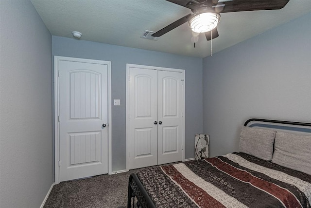 carpeted bedroom featuring ceiling fan