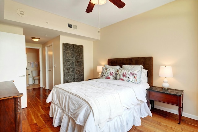 bedroom with hardwood / wood-style floors and ceiling fan