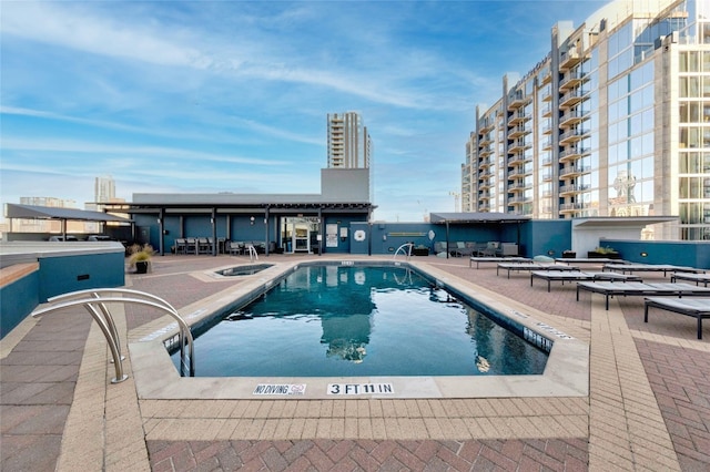 view of pool featuring a patio area