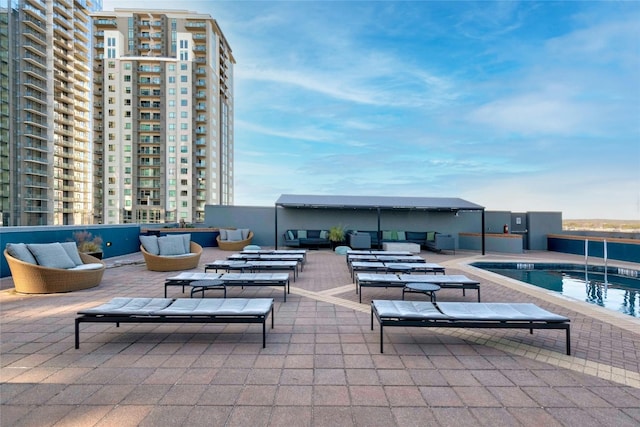 view of patio / terrace featuring a community pool