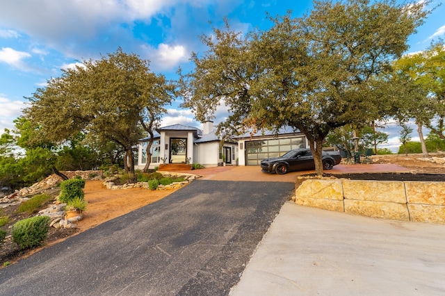 view of front of property with a garage