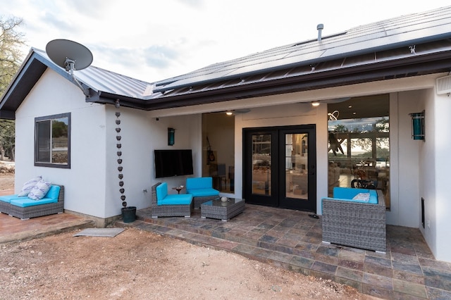 exterior space with french doors and a patio area