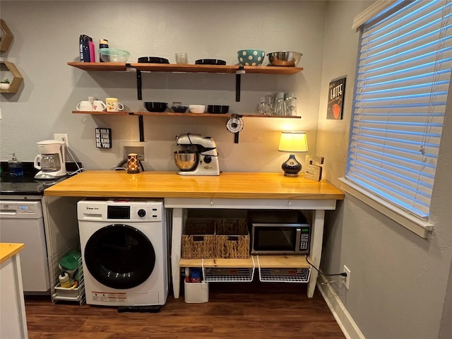 laundry area with washer / clothes dryer and dark wood-type flooring