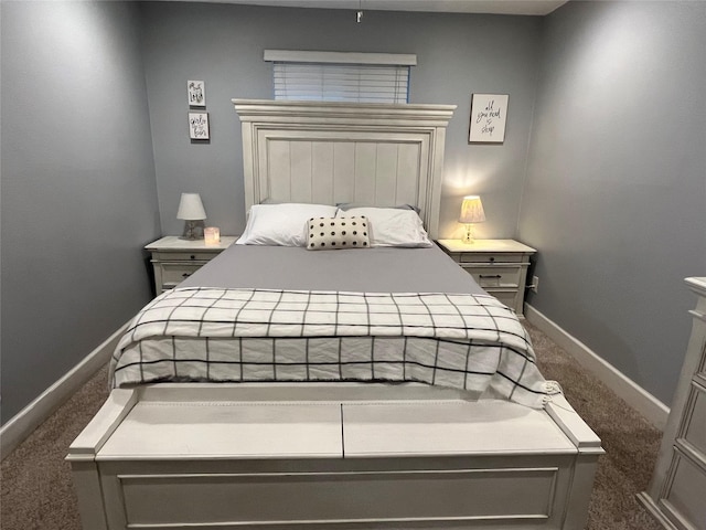 bedroom featuring dark colored carpet