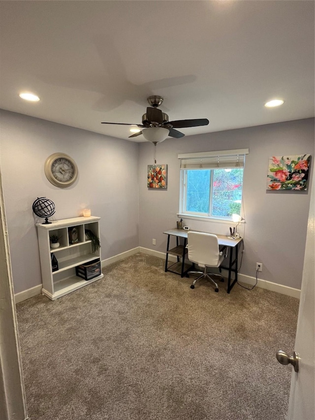 office with carpet floors and ceiling fan