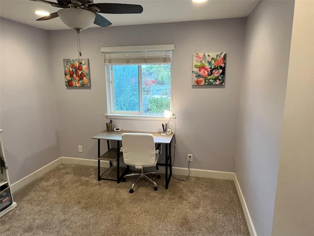 office space with carpet floors and ceiling fan