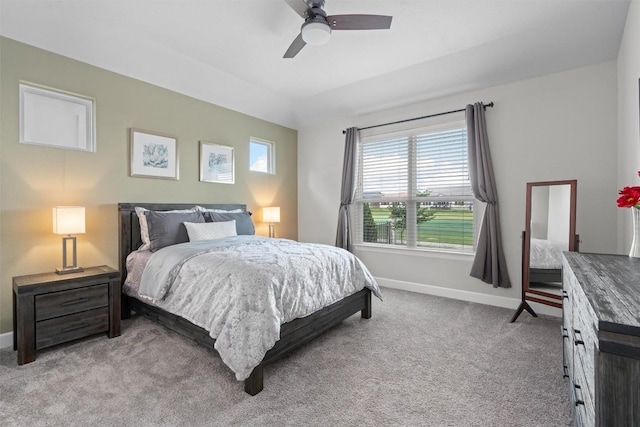 bedroom with ceiling fan and light carpet